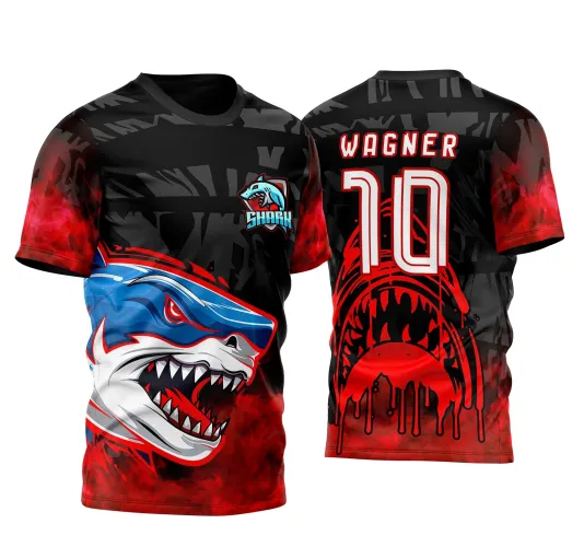 Camisa preta com degradê vermelho nas mangas e parte inferior, frente com tubarão azul e branco em destaque e escudo SHARK no peito. Costas com tubarão vermelho derretido, nome WAGNER e número 10 em branco com contorno vermelho.