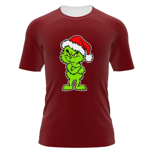 Camisa vermelha estampada por inteiro, com personagem verde emburrado usando gorro de Natal na frente, ideal para looks natalinos divertidos.
