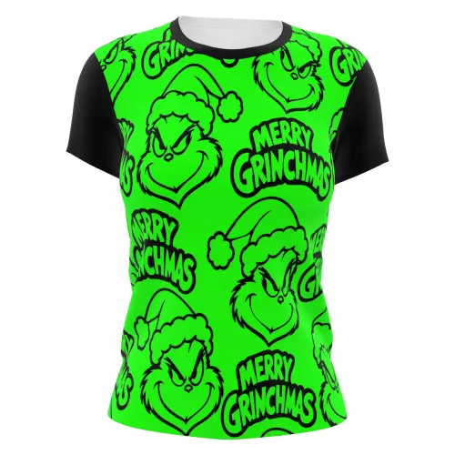 Camisa inteira estampada com fundo verde vibrante, carinhas travessas do Grinch usando gorro de Natal e a frase Merry Grinchmas repetida, com mangas e gola pretas.