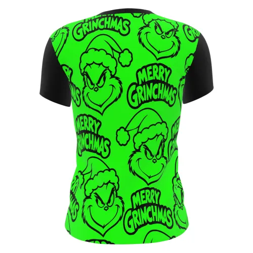 Camisa inteira estampada com fundo verde vibrante, carinhas travessas do Grinch usando gorro de Natal e a frase Merry Grinchmas repetida, com mangas e gola pretas.