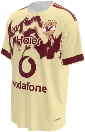Camisa terceiro uniforme do Al Ahly SC 2026 - 2027 creme com asas bordô no peito, frente e costas